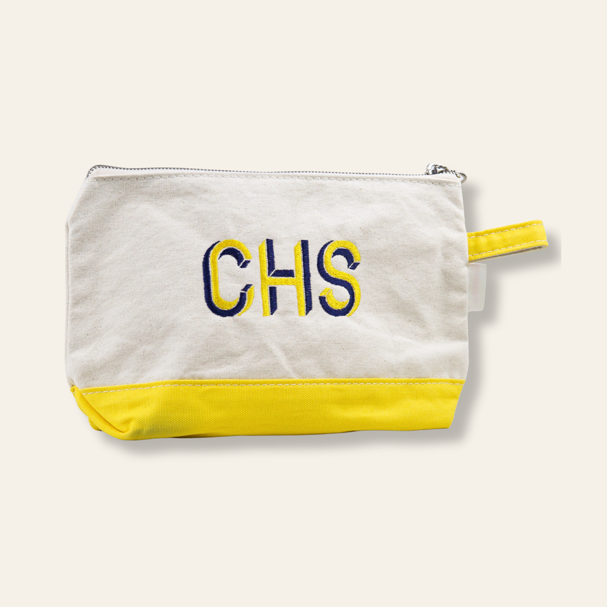 A canvas zipper pouch embroidered with CHS, the airport code for Charleston, South Carolina. Perfect for travel, gifting, and everyday use.
