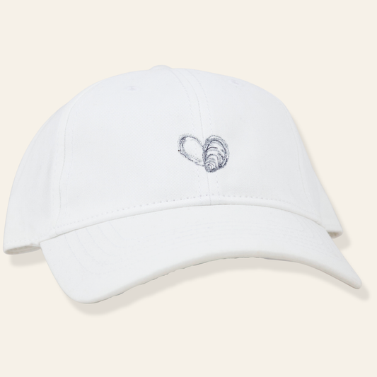 White embroidered oyster cap made from soft cotton with an adjustable fit. A timeless coastal accessory perfect for everyday wear.
