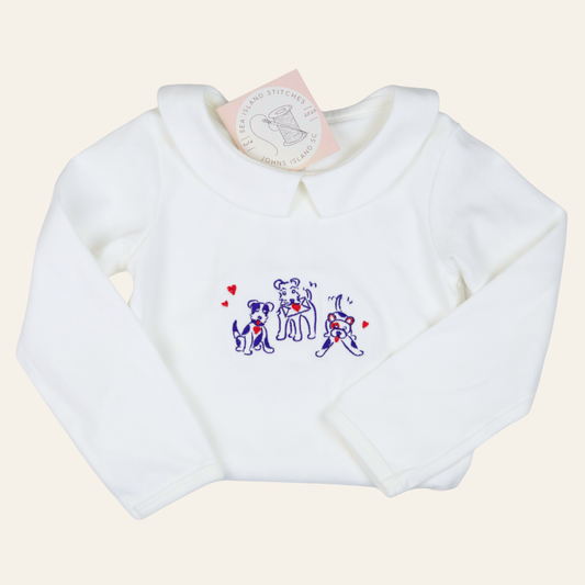 White baby sweatshirt featuring embroidered puppies and red hearts with a classic Peter Pan collar. Soft, sweet, and perfect for everyday or special occasions.