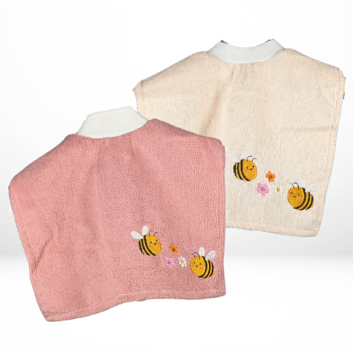 Two terry cloth baby bibs, one pink and one beige, each with a white ribbed neckline and embroidered bees buzzing around small colorful flowers near the bottom.