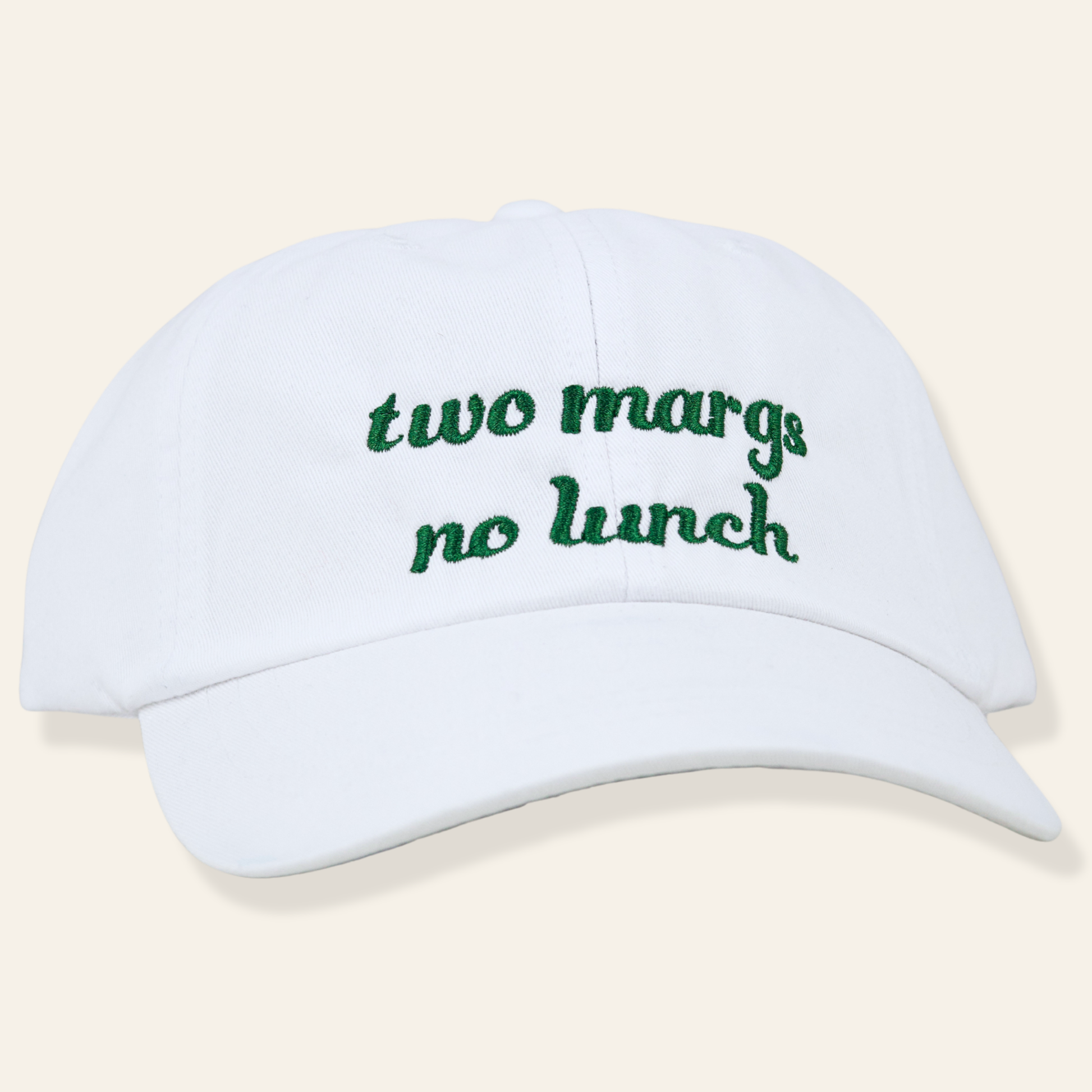 White embroidered cap featuring “two margs, no lunch.” Soft cotton, adjustable fit, and a fun everyday accessory perfect for gifting.